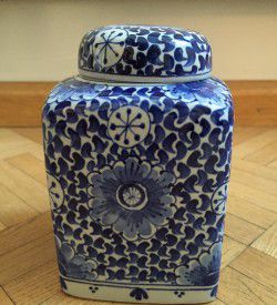 white and blue Delft jar